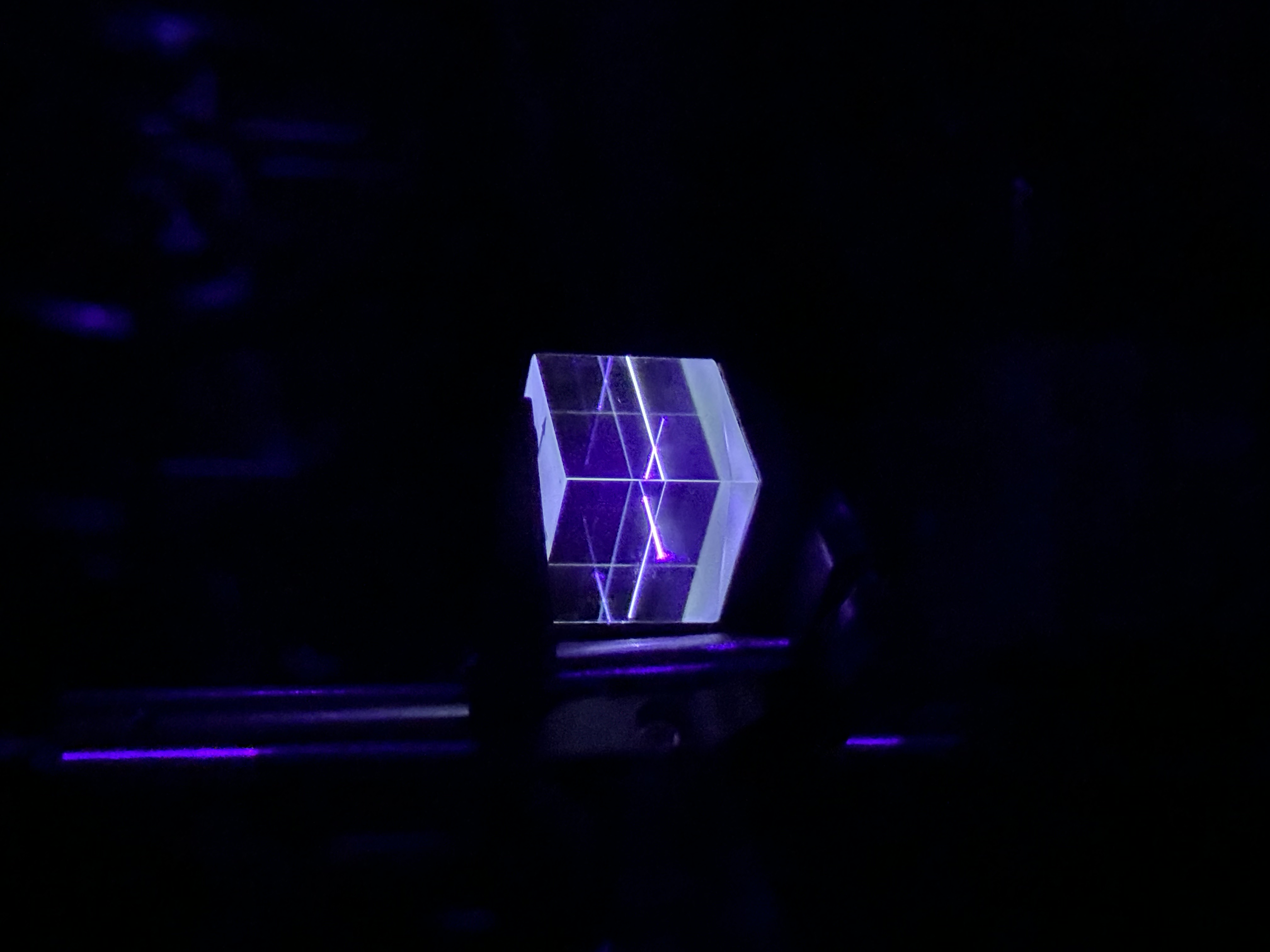 Optics bench with BBO crystal and laser setup